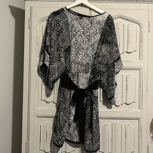 Cute Little black and white number. Mini dress with bat sleeves